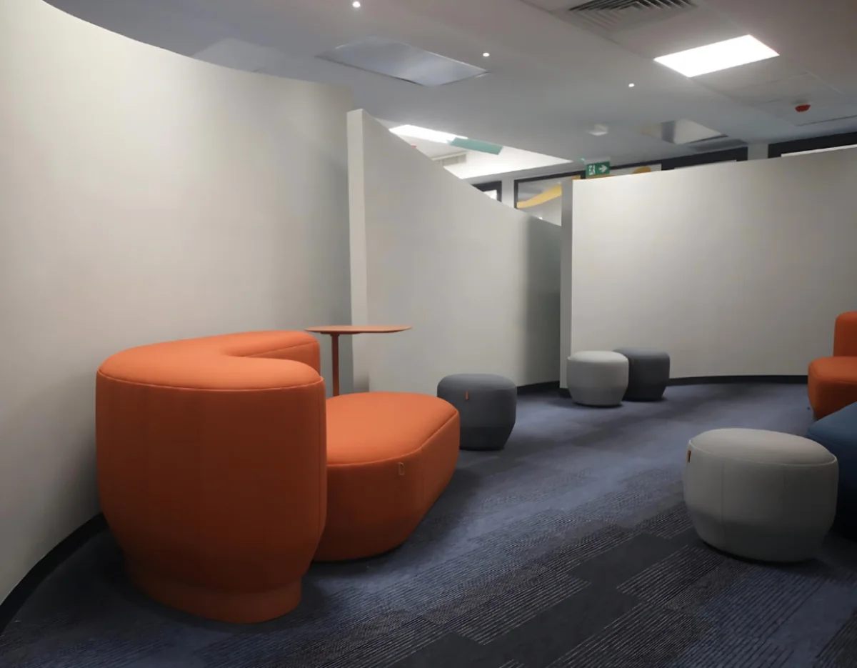 Office lounge with orange seating