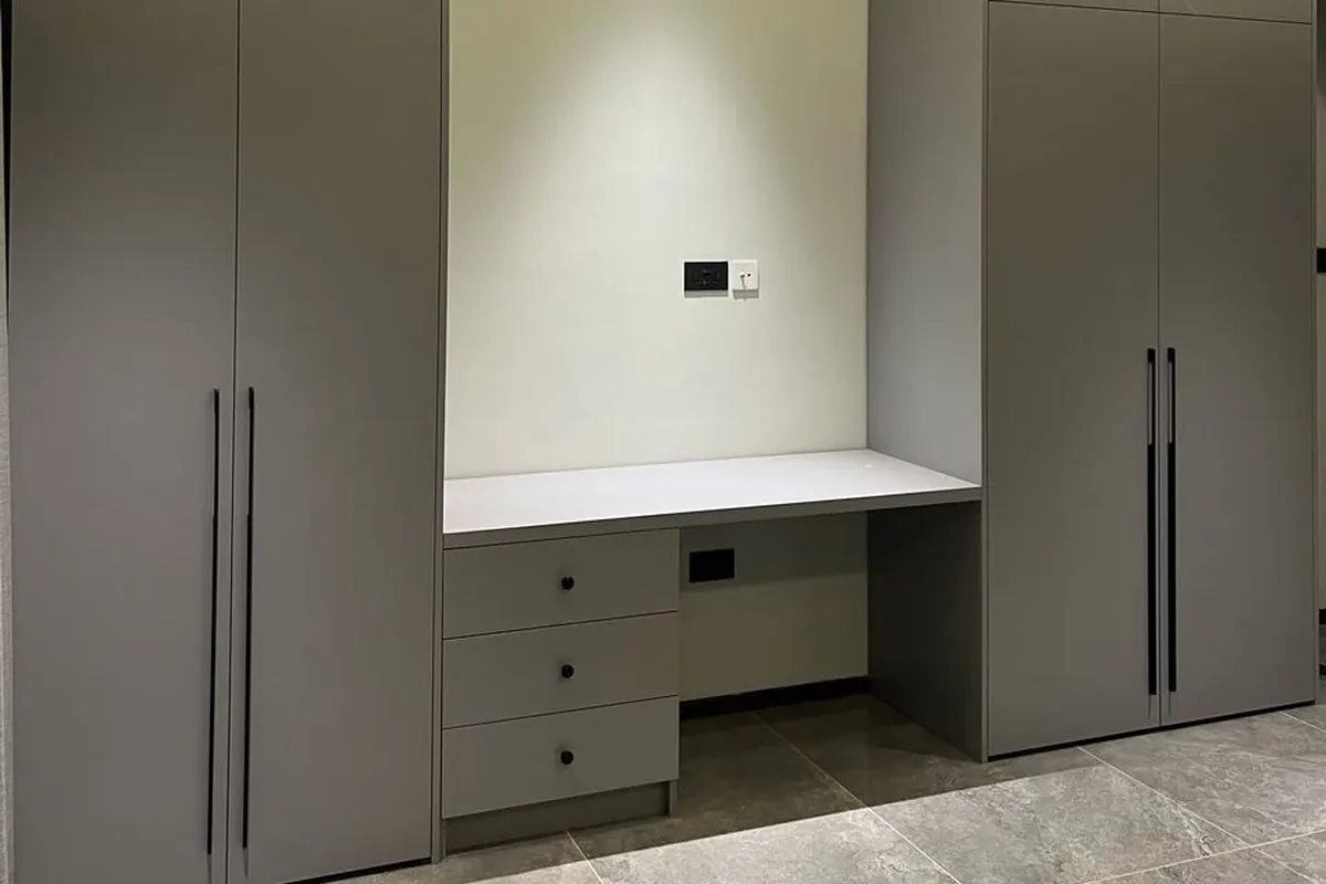Built-in wardrobes with a fitted desk